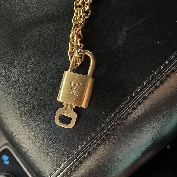 Authentic Louis Vuitton lock necklace —purchased for $280. NWT - Picture 3 of 8